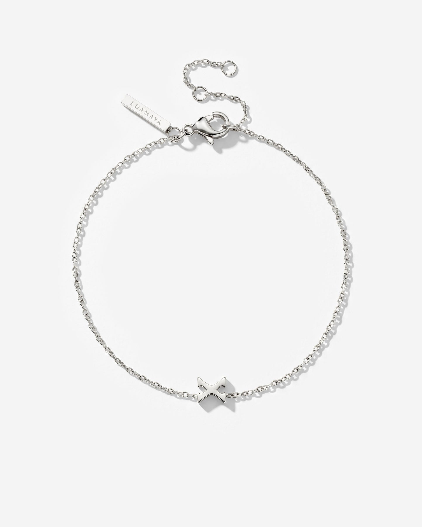 [[Farbe:Silber,Buchstabe:X]]
