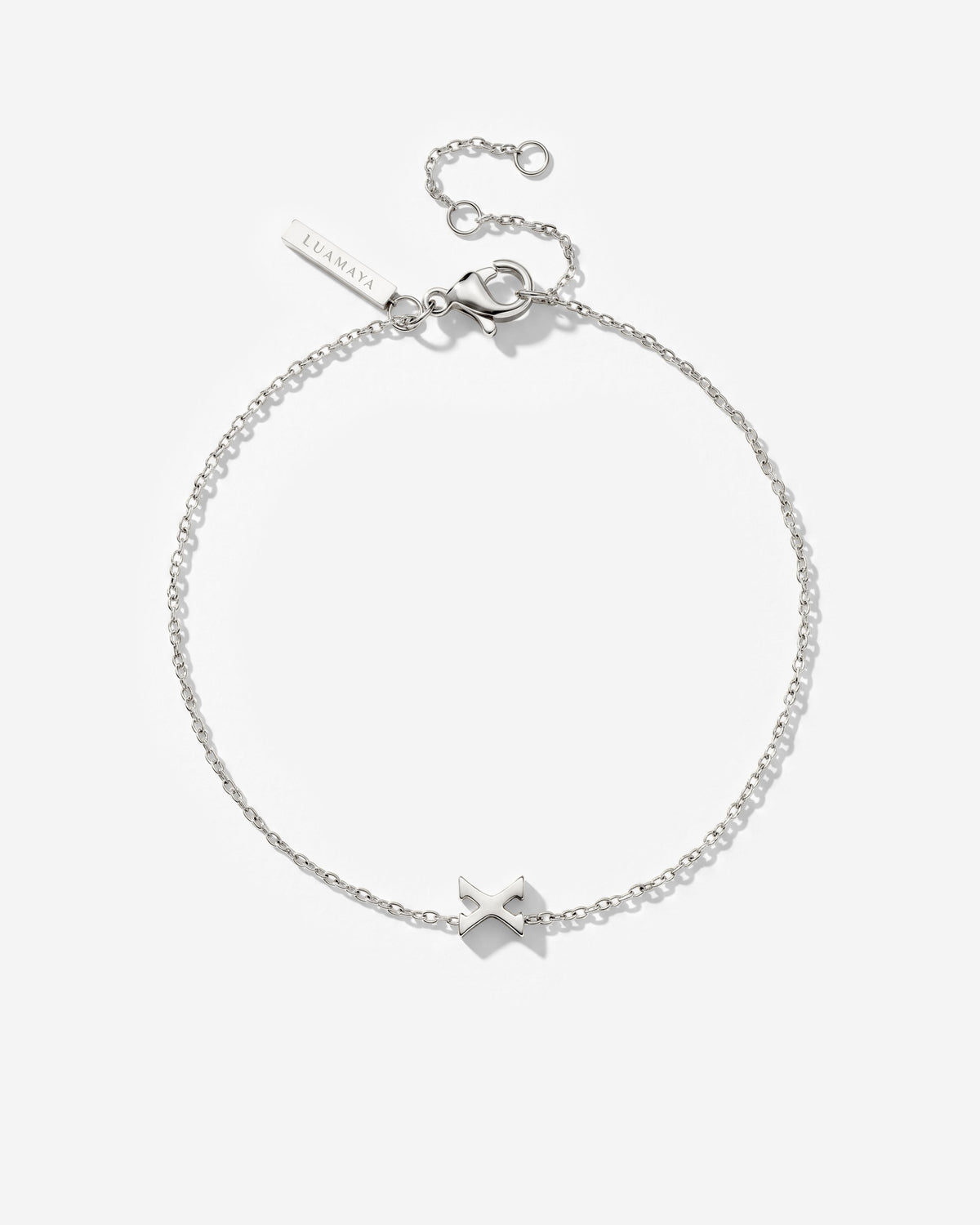 [[Farbe:Silber,Buchstabe:X]]