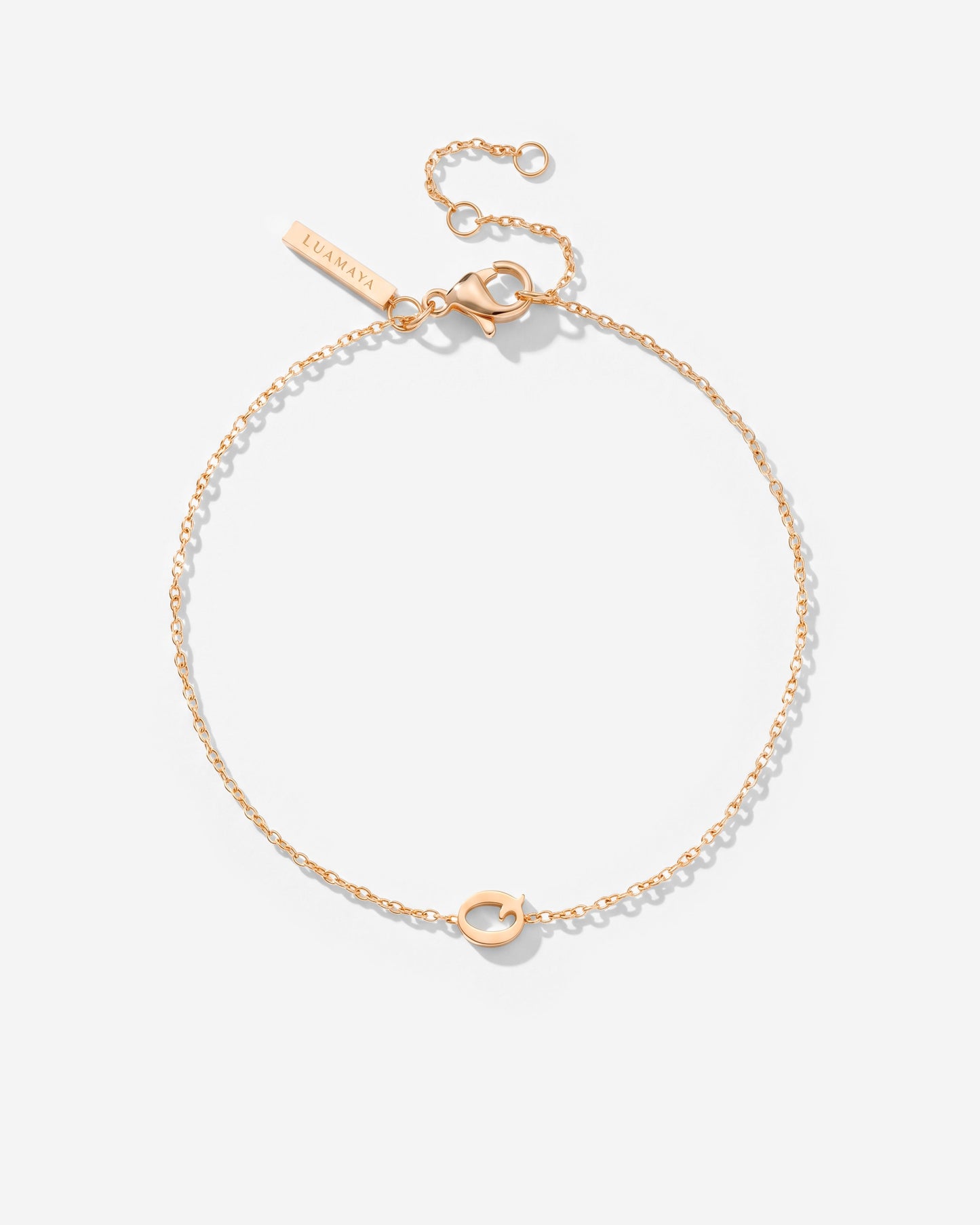 [[Buchstabe:Q,Farbe:Roségold]]