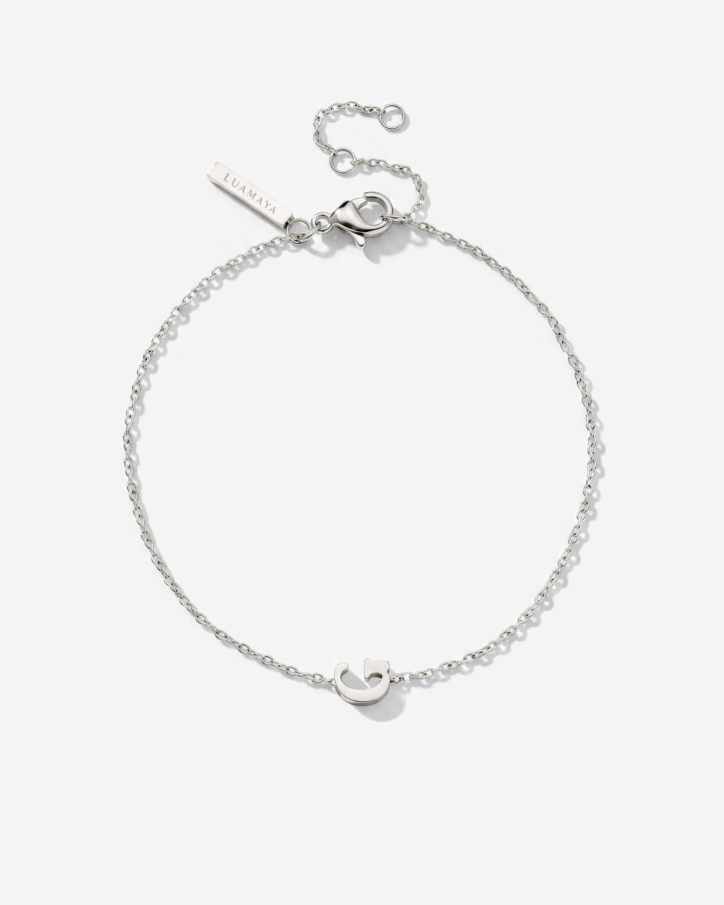 [[Farbe:Silber,Buchstabe:G]]