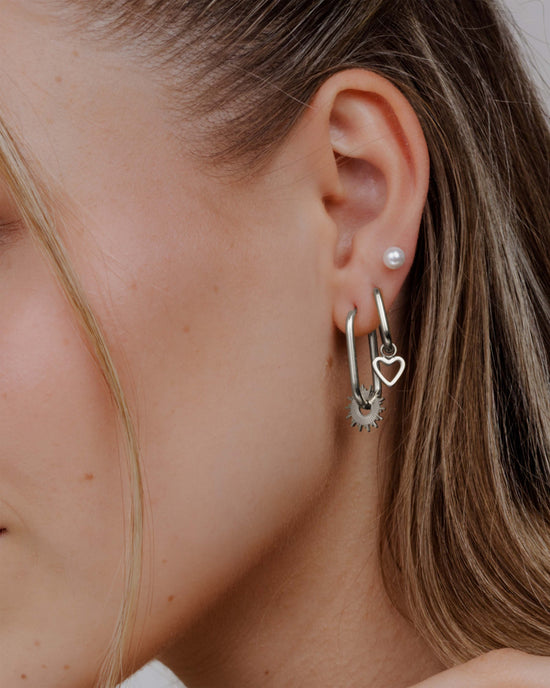Sun Ray Oval Hoops Small Silber