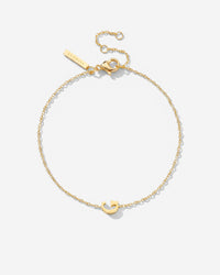 [[Farbe:Gold,Buchstabe:G]]