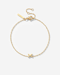[[Farbe:Gold,Buchstabe:X]]
