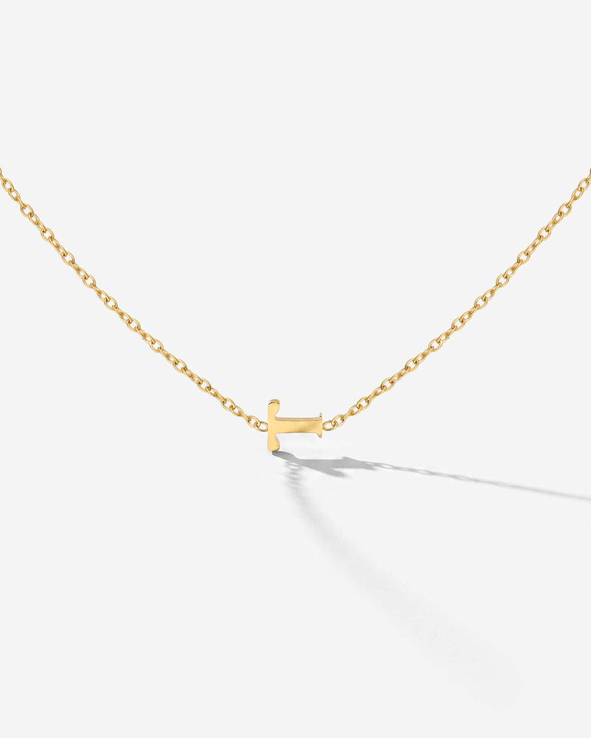[[Farbe:Gold,Buchstabe:T]]