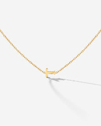 [[Farbe:Gold,Buchstabe:T]]