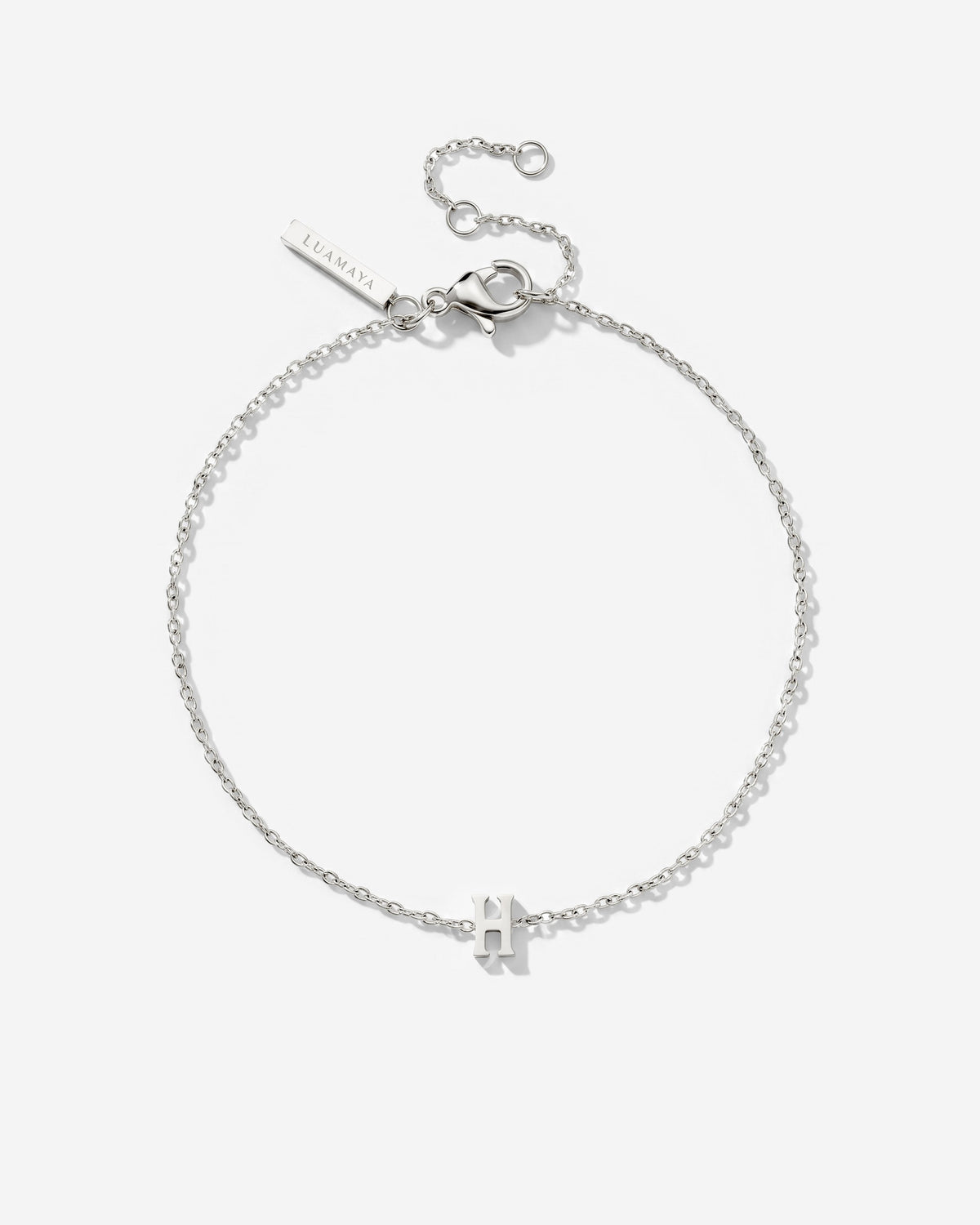[[Farbe:Silber,Buchstabe:H]]
